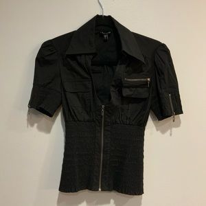 Black zip up top with elasticized bottom and zipper detail